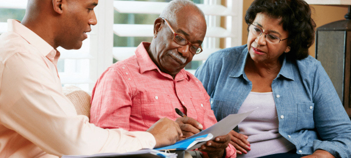 Seniors looking at documents