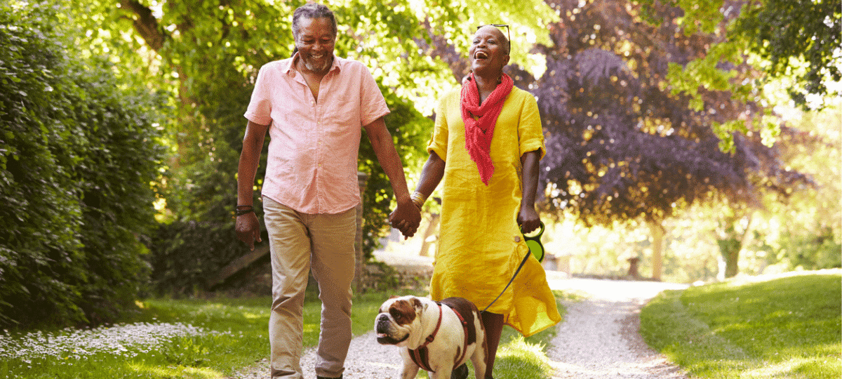 Couple Walking Dog