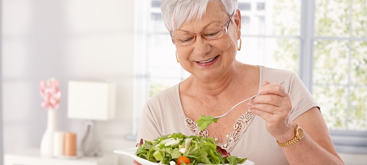 Woman Eating Salad