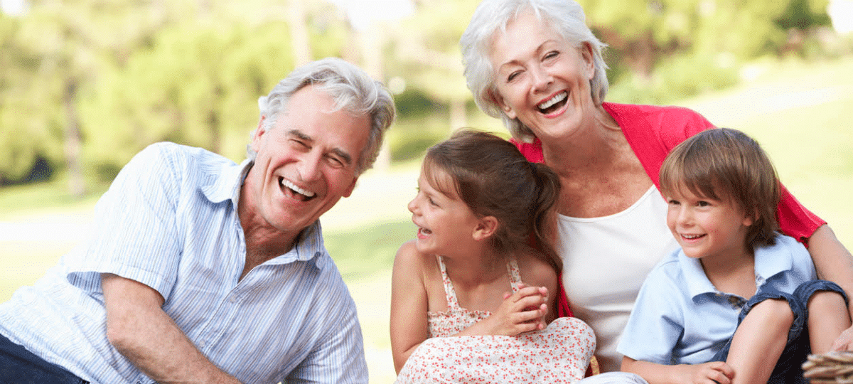 Grandparents And Grandchildren On A Picnic