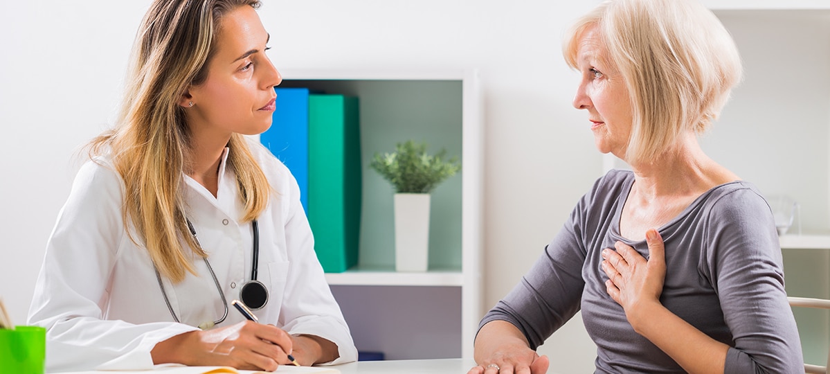 Woman Talking to Doctor