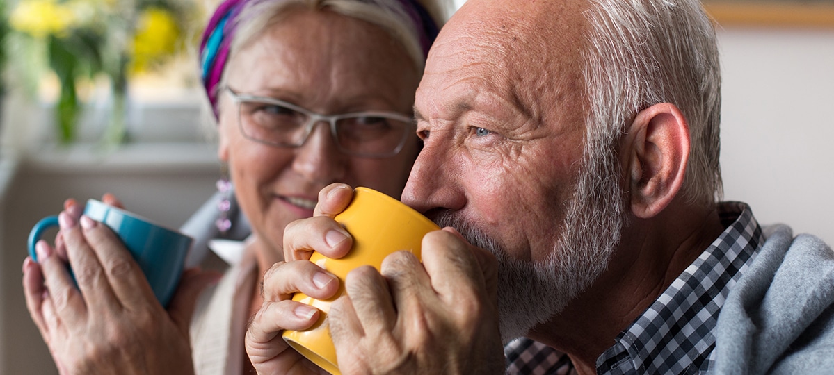 Man Sipping Mug of Coffee