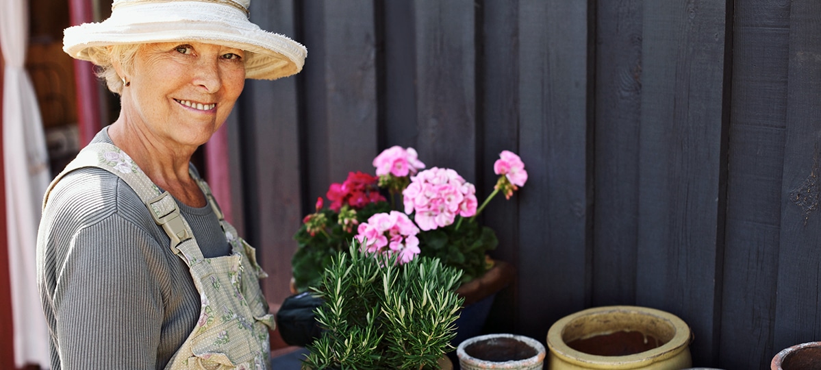 Woman in Sunhat Gardening