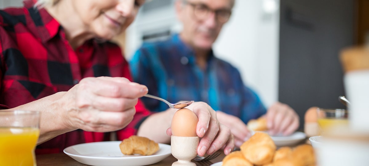 Woman Eating Soft Boiled Egg