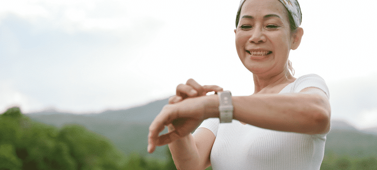 Woman Looking At Smartwatch